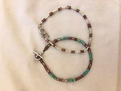 Set Of 2 Green/Purple Motif Anklets